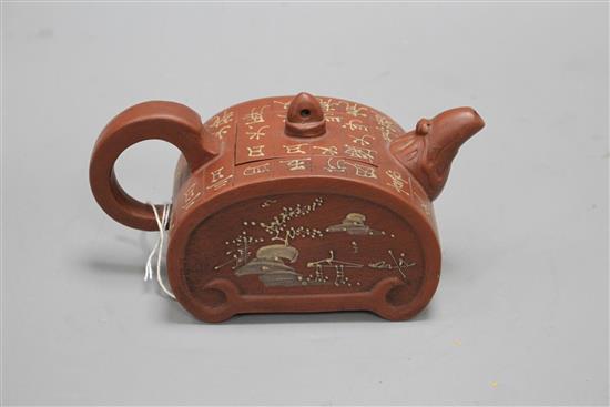 A Chinese Yixing ruyi head shaped teapot, with slip decoration, L. 17.5cm